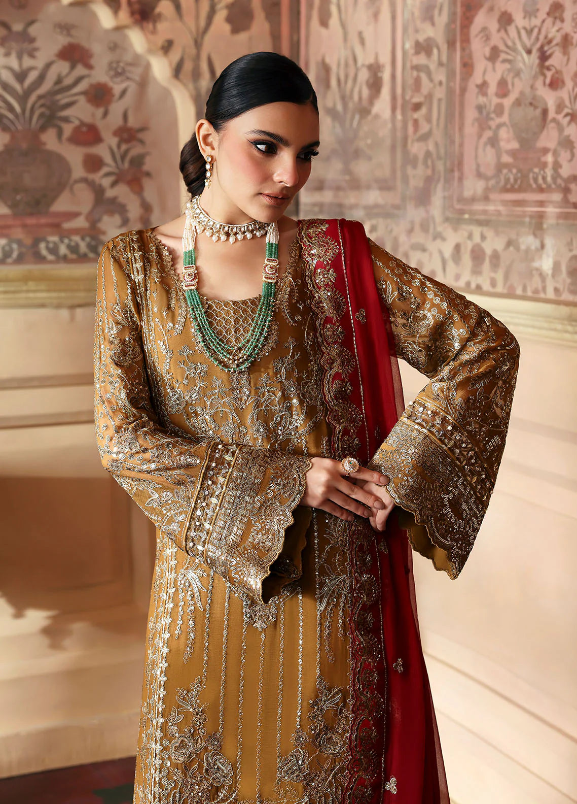 Model wearing Dinara by Gulaal in mustard and maroon with heavy chiffon embroidery – Pakistani luxury pret outfit online in UK.