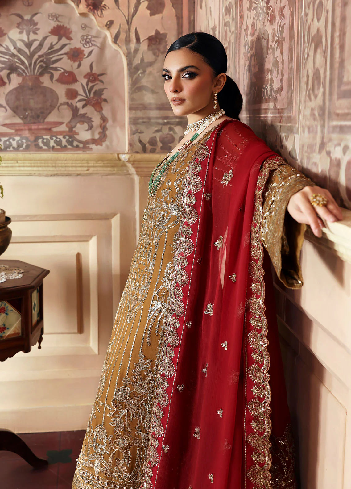 Model wearing Dinara by Gulaal in mustard and maroon with heavy chiffon embroidery – Pakistani luxury pret outfit online in UK.