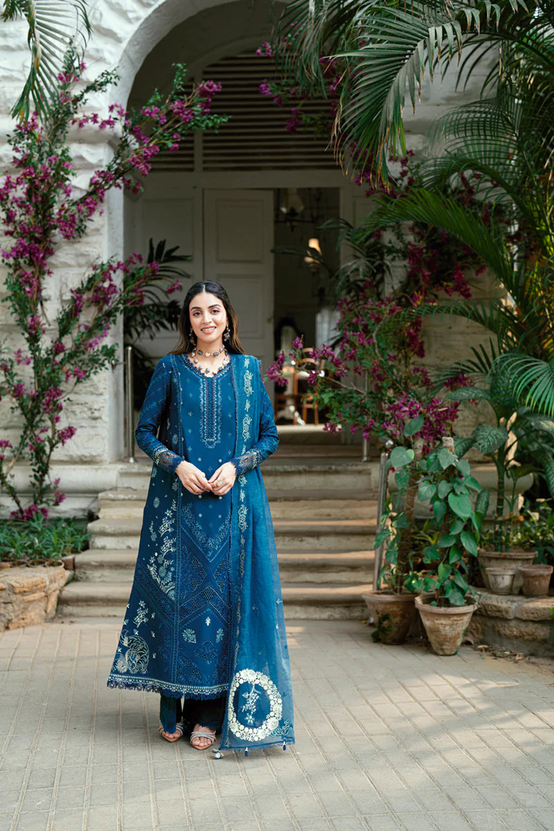 Model wearing deep teal blue Qalamkar SB-11 Noray embroidered outfit, perfect for Eid and Pakistani luxury pret clothes online in UK.