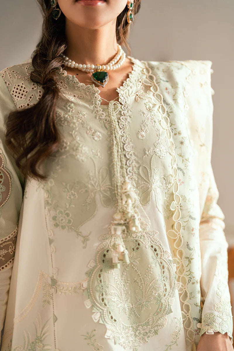 Model wearing pistachio green Qalamkar SB-10 Nadia embroidered outfit, perfect for Eid and Pakistani luxury pret clothes online in UK.