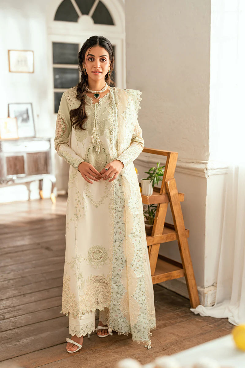 Model wearing pistachio green Qalamkar SB-10 Nadia embroidered outfit, perfect for Eid and Pakistani luxury pret clothes online in UK.