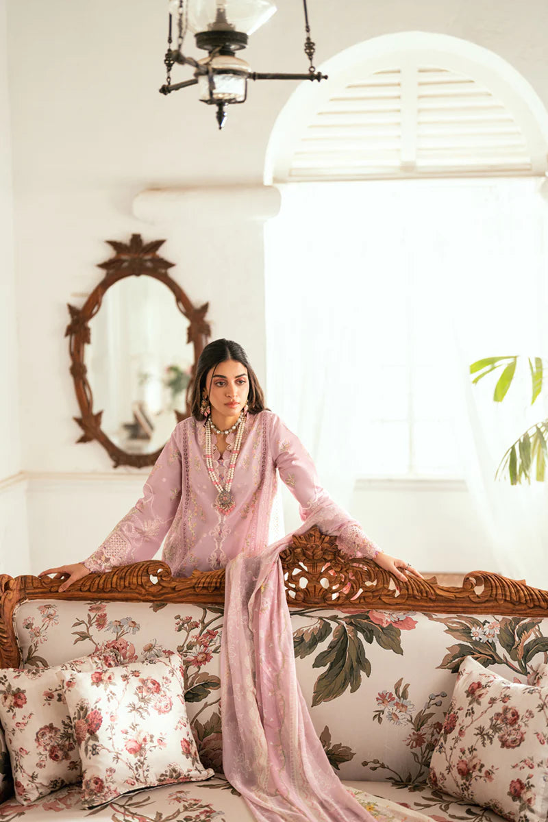 Model wearing lilac Qalamkar SB-06 Komal suit with pastel embroidery, ideal for Eid celebrations and Pakistani luxury pret online in UK.