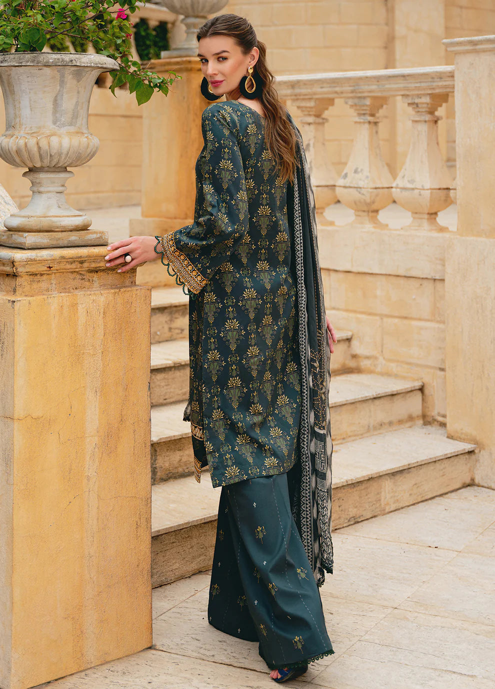 Model in Gulaal VILLENA, traditional Pakistani ensemble, UK's favorite.