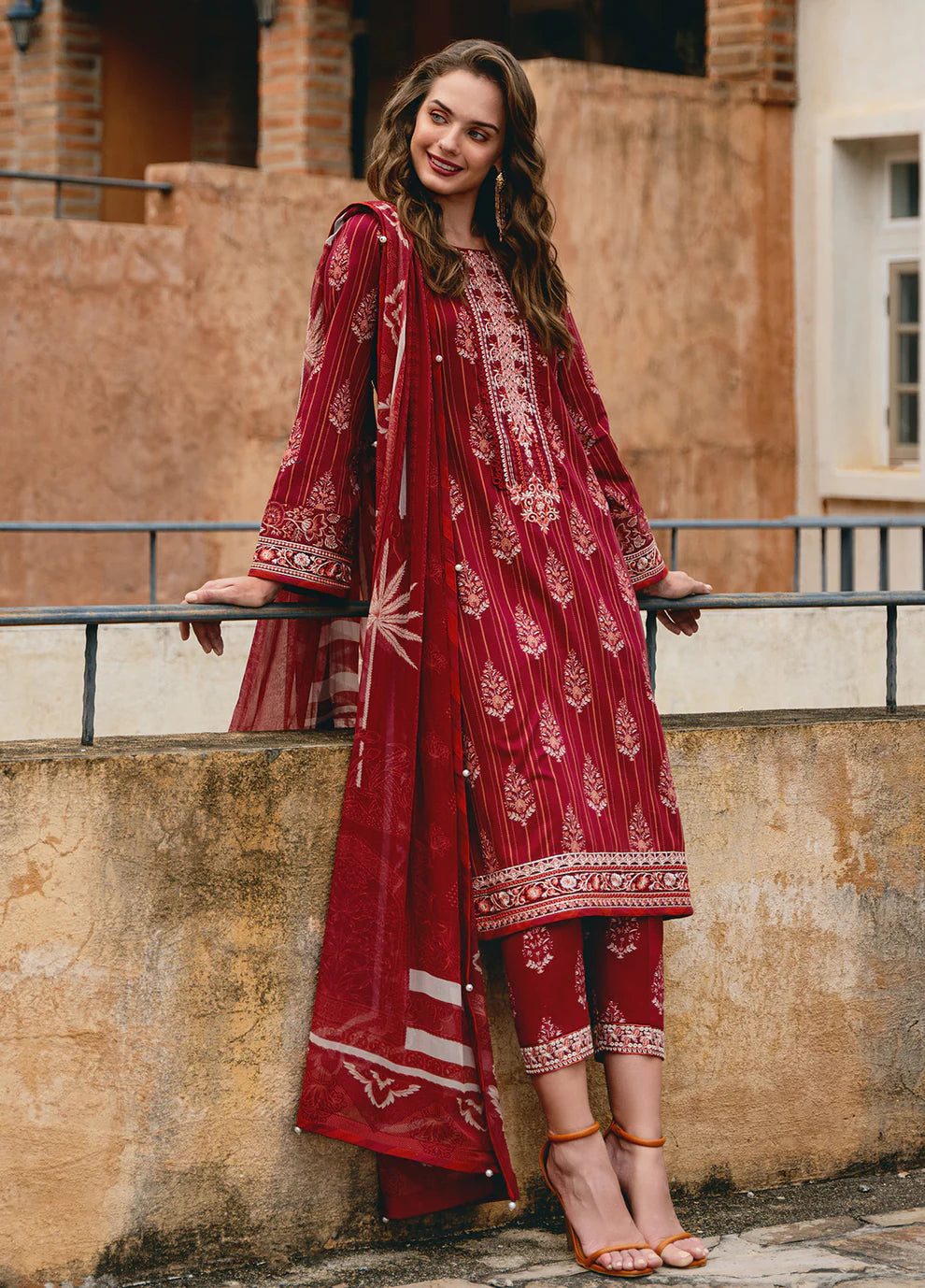 Model in Gulaal VEZELAY, intricate Pakistani dress, UK style.