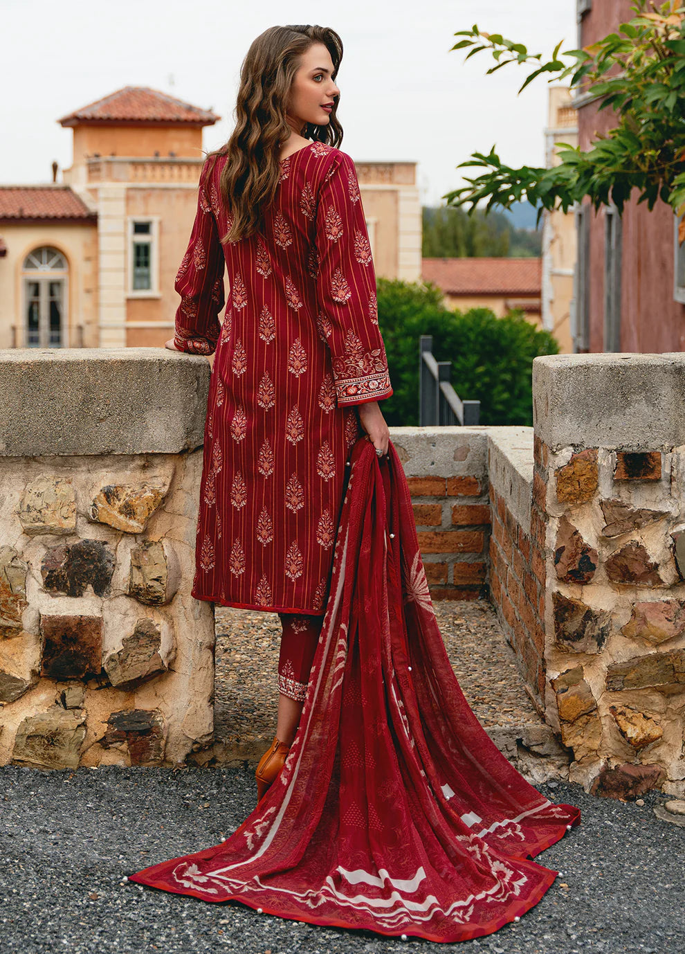 Model in Gulaal VEZELAY, intricate Pakistani dress, UK style.