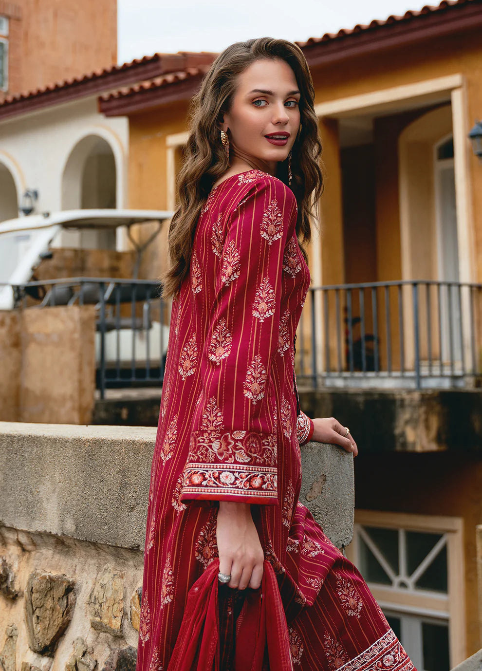 Model in Gulaal VEZELAY, intricate Pakistani dress, UK style.