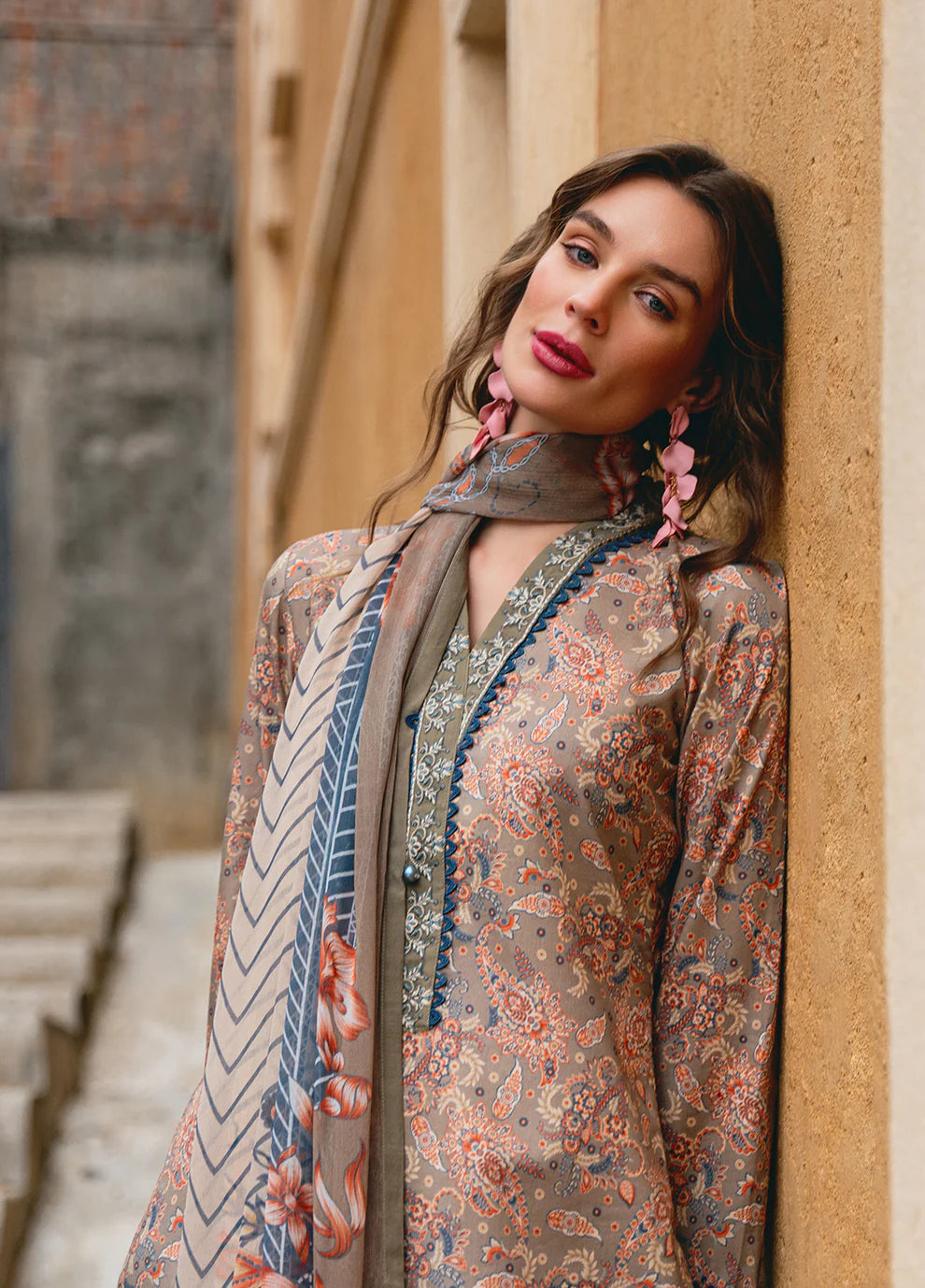 Model in Gulaal AVILA, elegant UK Pakistani outfit, floral design.