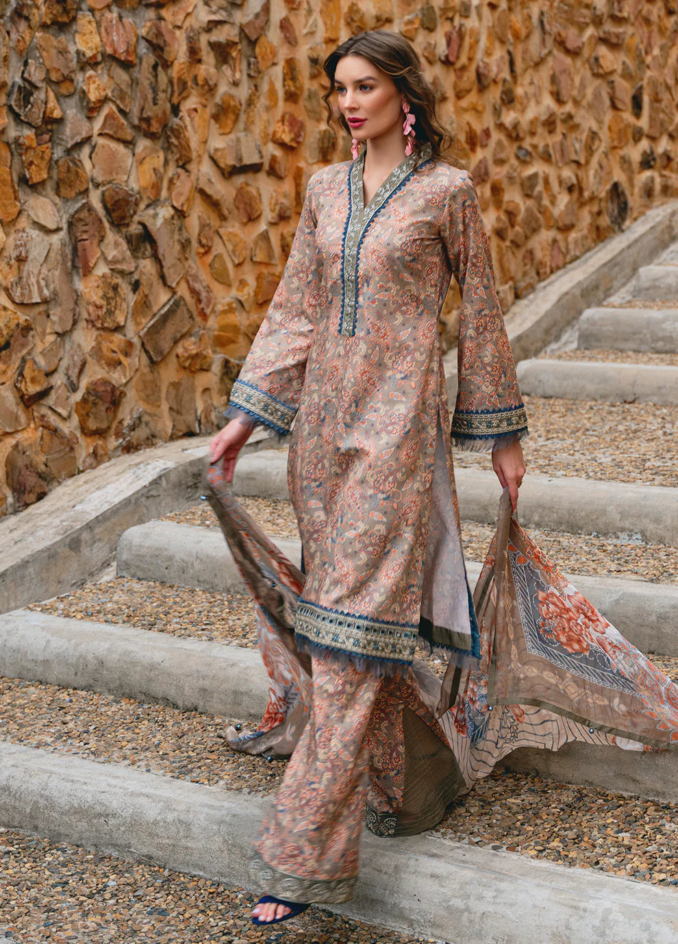 Model in Gulaal AVILA, elegant UK Pakistani outfit, floral design.