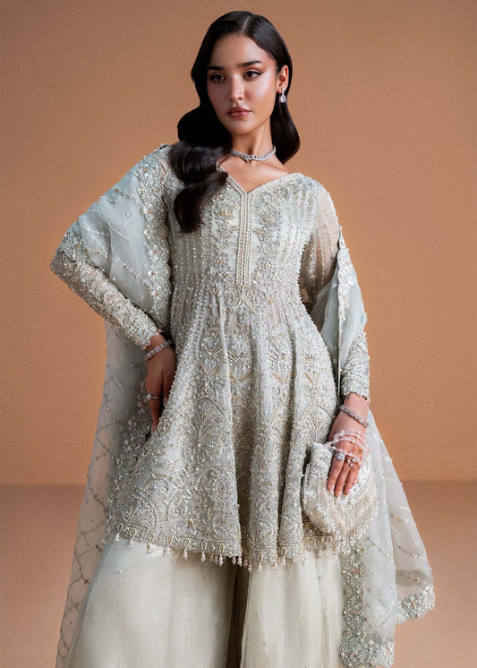 Model wearing silver Mahira outfit from Kanwal Malik, perfect for Pakistani luxury pret and Pakistani clothes online in UK.
