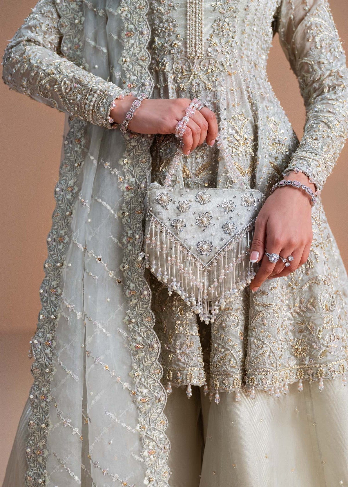 Model wearing silver Mahira outfit from Kanwal Malik, perfect for Pakistani luxury pret and Pakistani clothes online in UK.
