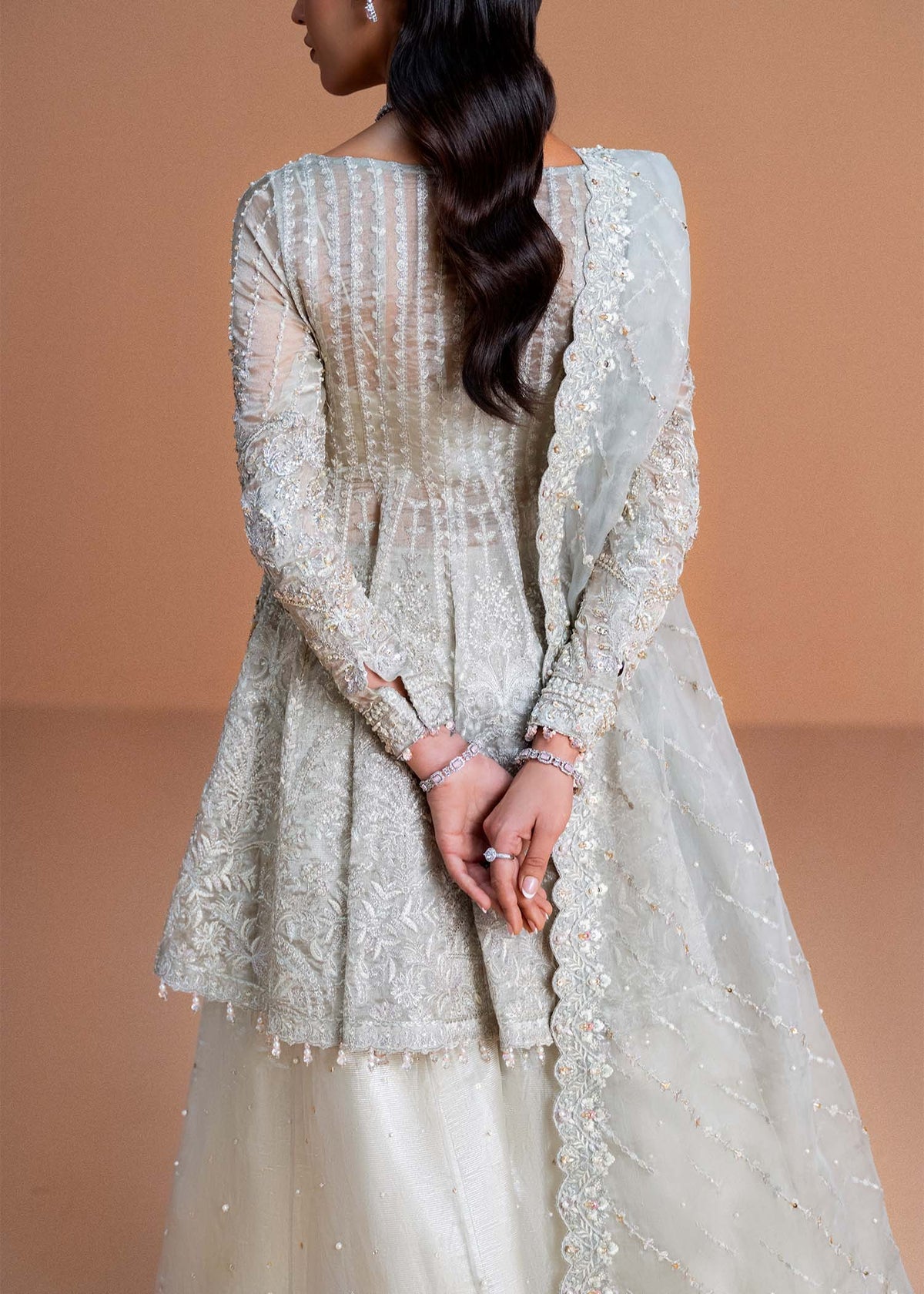 Model wearing silver Mahira outfit from Kanwal Malik, perfect for Pakistani luxury pret and Pakistani clothes online in UK.
