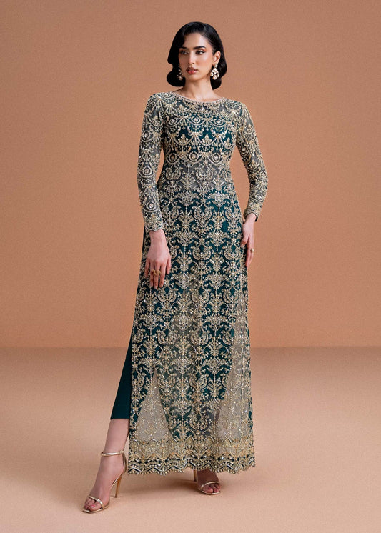 Model wearing deep green and gold Zaira dress from Kanwal Malik, ideal for Pakistani luxury pret and Pakistani clothes online in UK.
