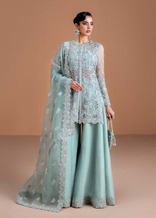 Model wearing mint green Vania outfit from Kanwal Malik, featuring delicate embroidery for Pakistani luxury pret and clothes online in UK.
