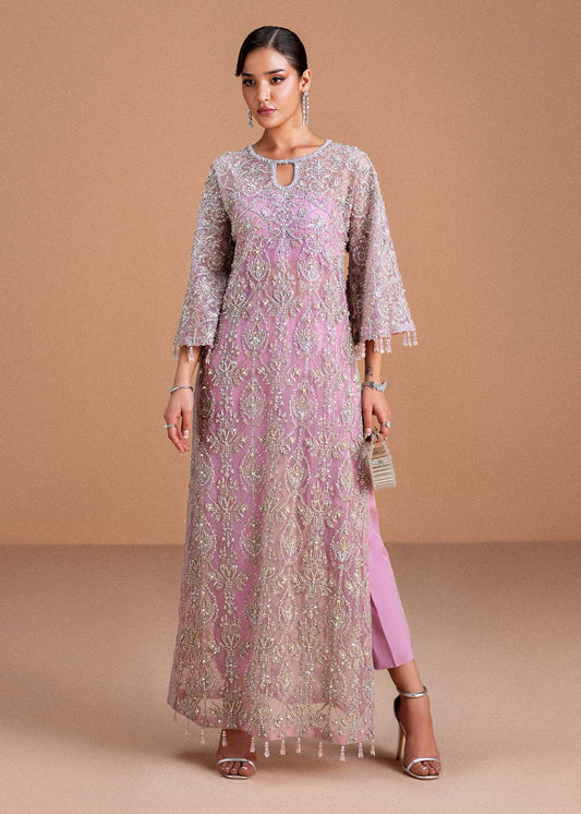 Model wearing blush pink Dina outfit from Kanwal Malik, showcasing intricate handwork for Pakistani luxury pret and clothes online in UK.
