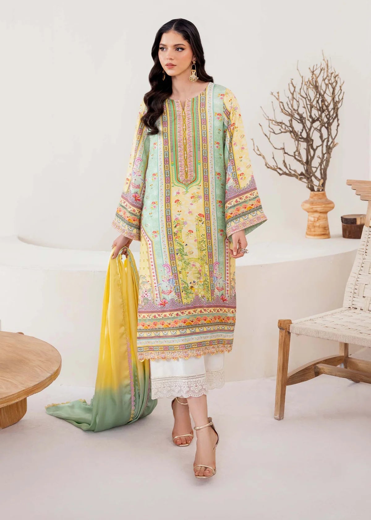Model wearing pastel yellow and mint green Mira from Kanwal Malik Rosalia Silk Eid Collection '25, Pakistani luxury pret online in UK.