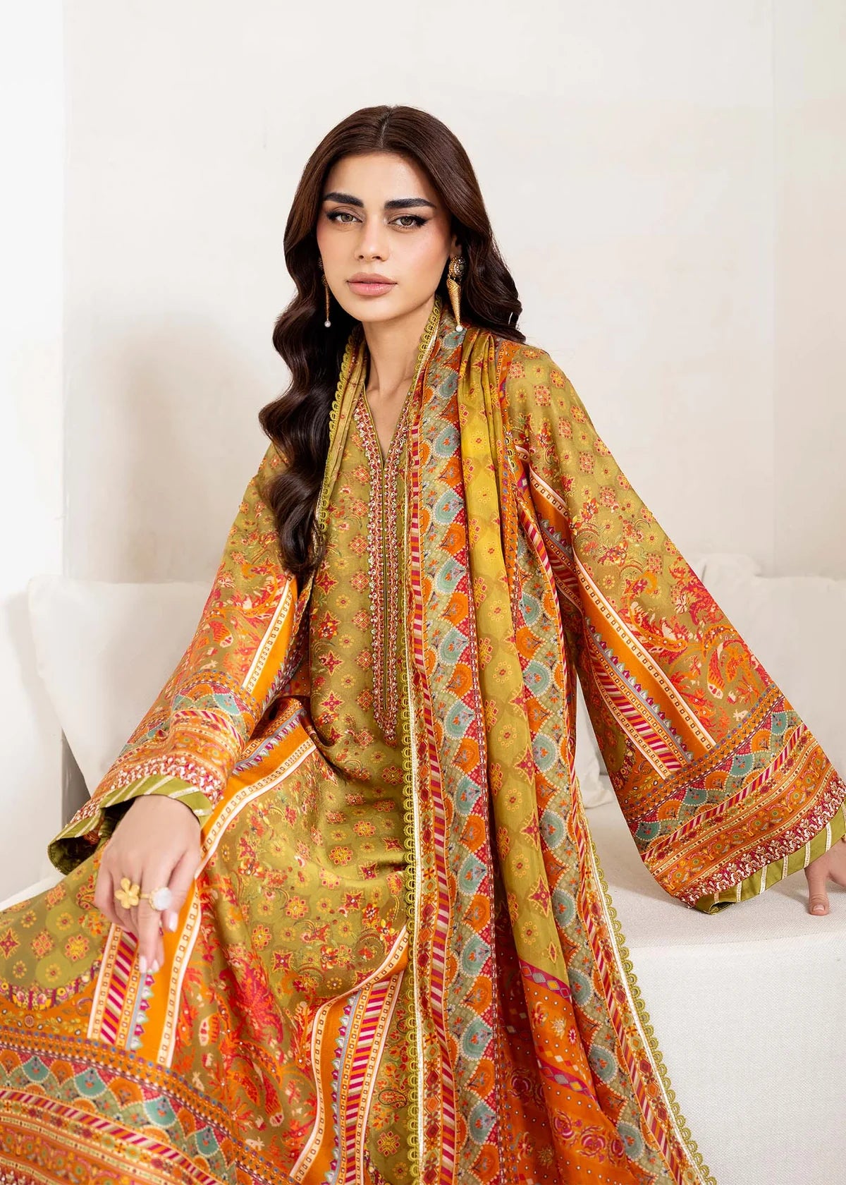 Model wearing olive and orange Elise from Kanwal Malik Rosalia Silk Eid Collection '25, Pakistani luxury pret and clothes online in UK.