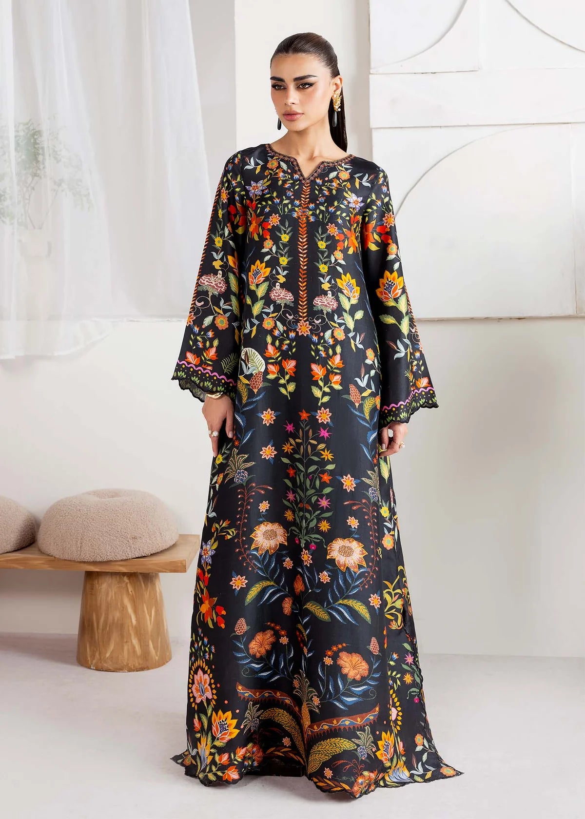 Model wearing black multicolour floral Kanwal Malik Sovana from Rosalia Silk Eid Collection '25, Pakistani luxury pret online in UK.
