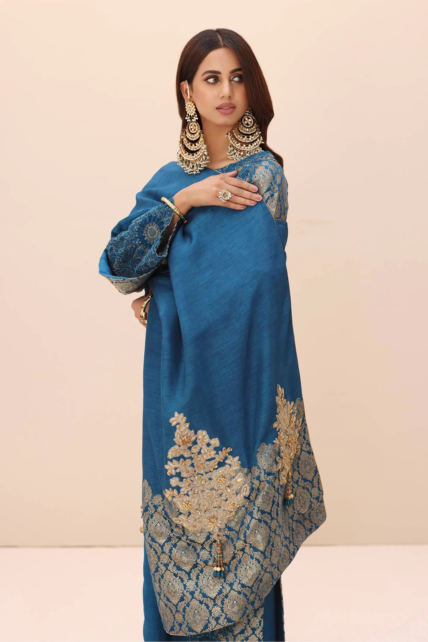 Model wearing Ethereal Embrace Shawl Collection's SAPPHIRE ELEGANCE SHAWL, an equisite mold by Musferah Saad UK, Pakistani Clothes UK.