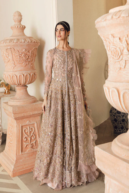 Model wearing blush pink heavily embellished gown Elveera from Mysie By Tahira Chiolite II, Pakistani luxury pret available online in UK.