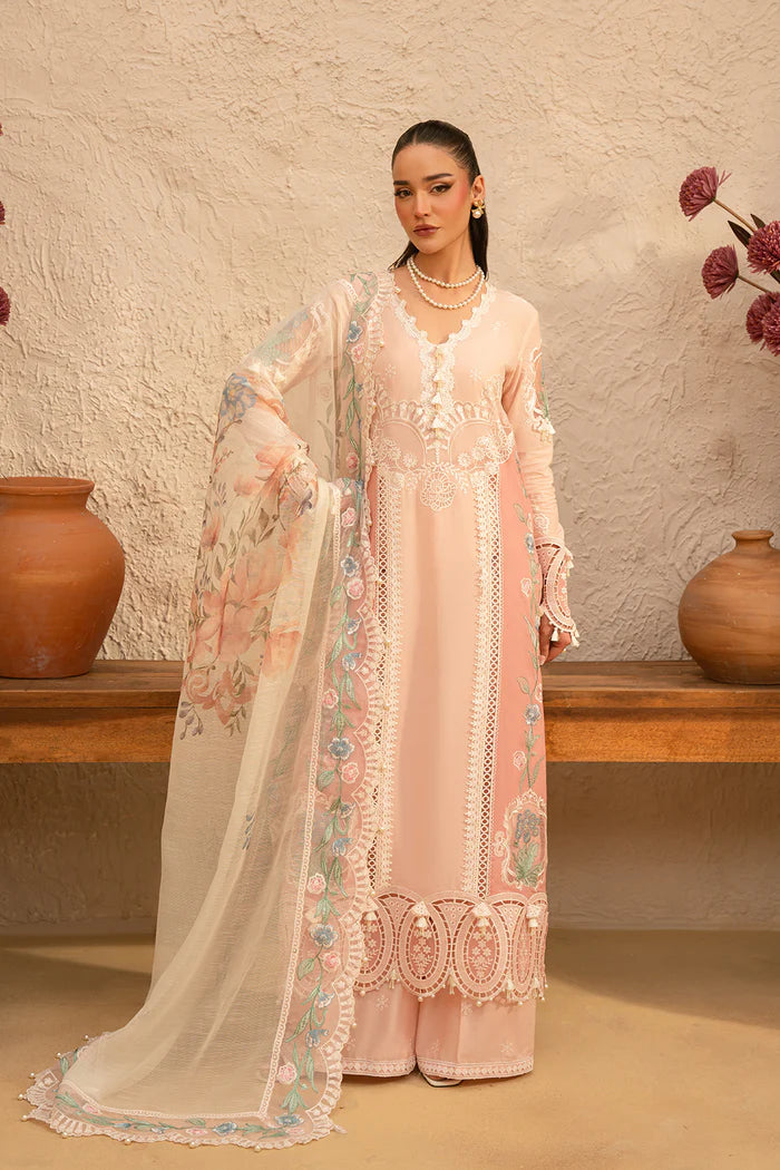 Model wearing soft peach embroidered dress with floral organza dupatta from Saira Rizwan, Pakistani luxury pret, Pakistani clothes online in UK.