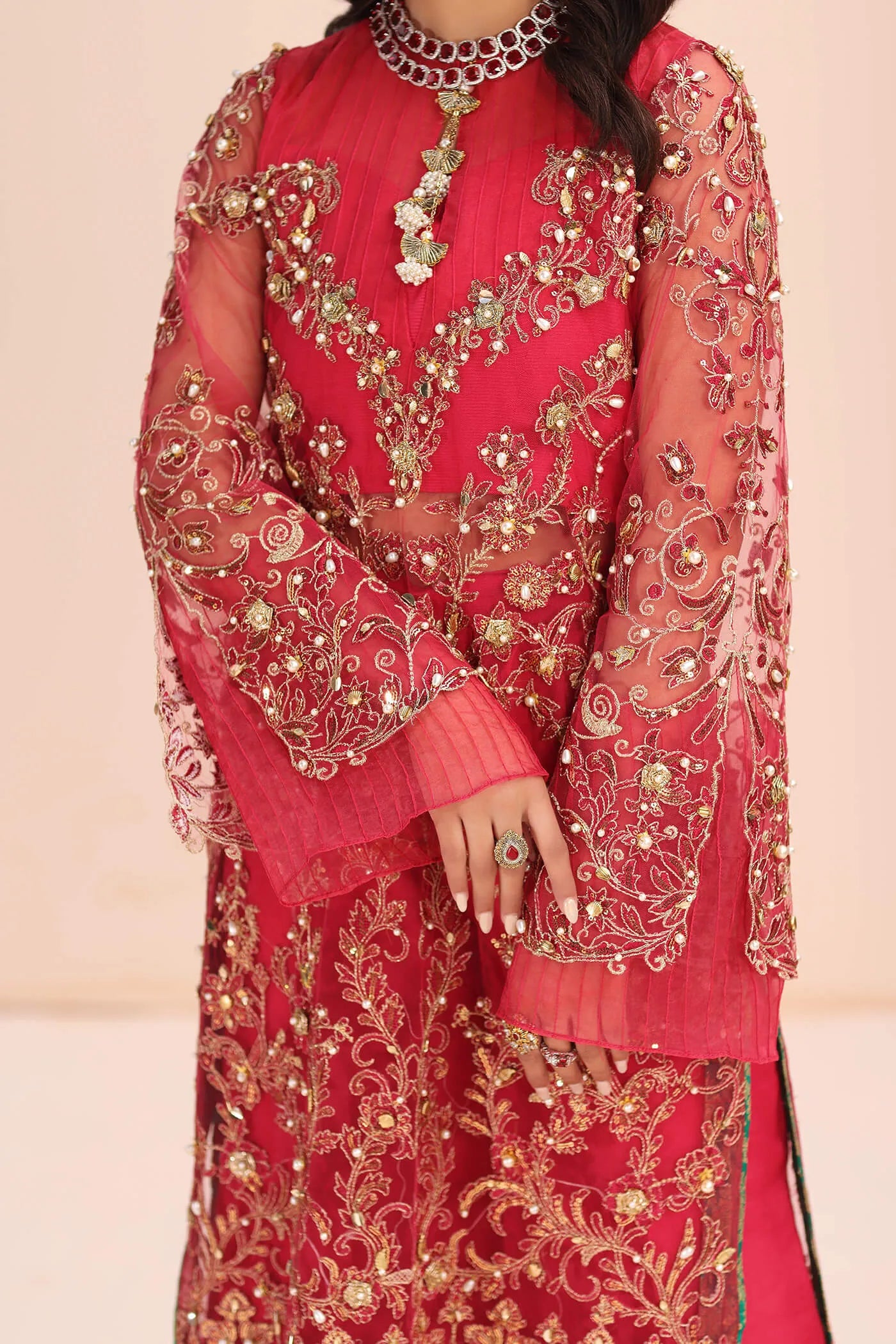 Model in Musferah Saad Fantasia pink Pakistani wedding dress, UK.