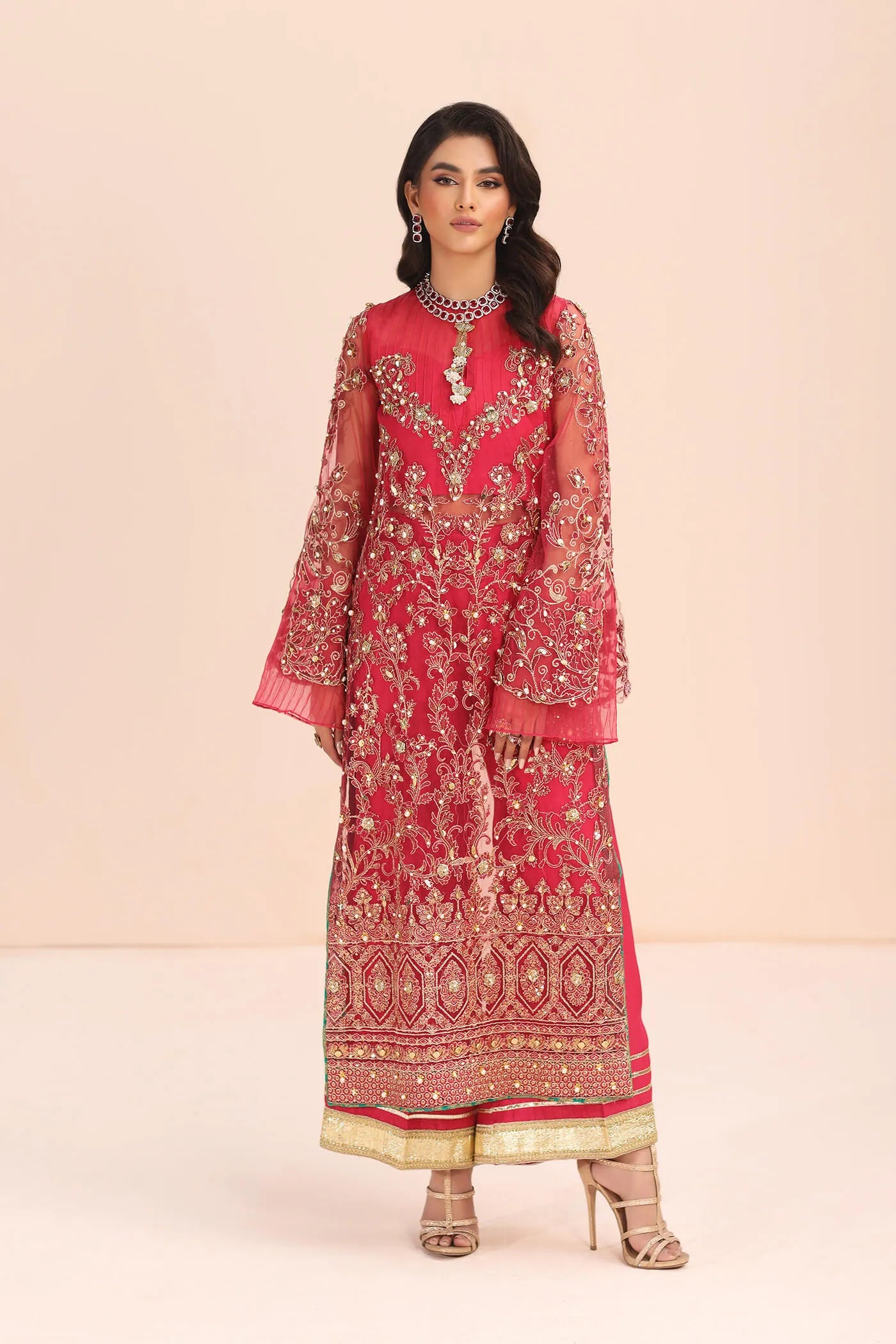 Model in Musferah Saad Fantasia pink Pakistani wedding dress, UK.