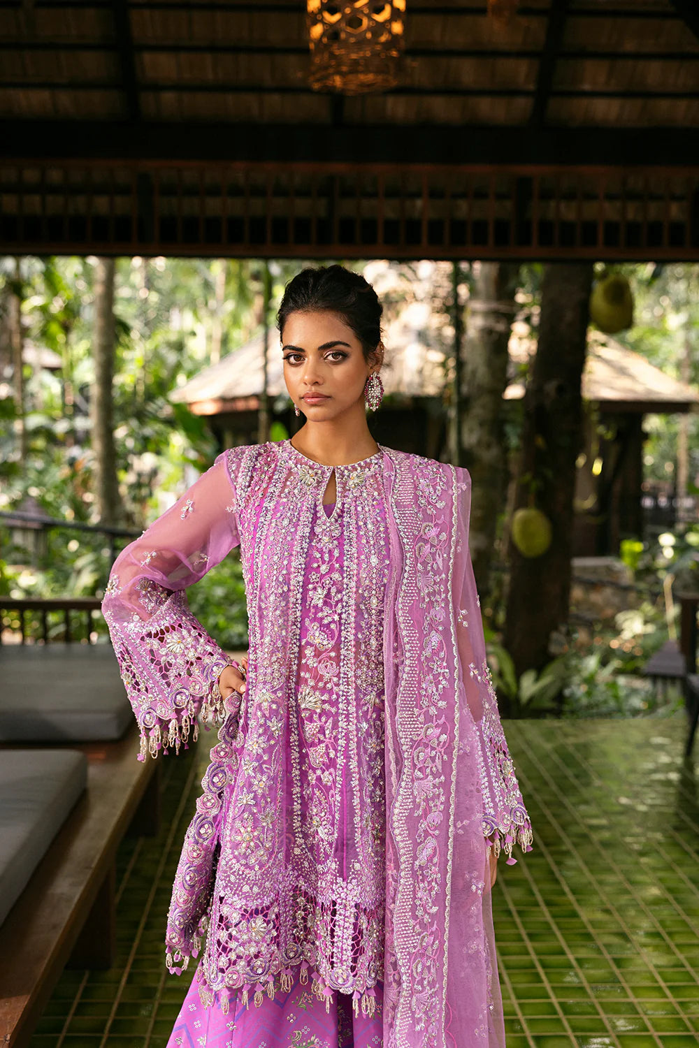 Model wearing Saira Rizwan LIYANA-SRF25-07 in lilac pink with intricate embroidery – Pakistani luxury pret, shop online in UK.
