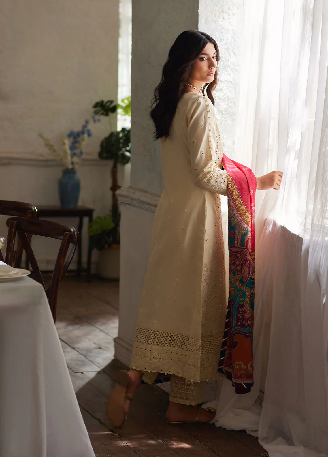Model wearing off-white Azmin from Gulaal Lumiere Chikankaari Lawn, Pakistani luxury pret and Pakistani clothes online in UK.