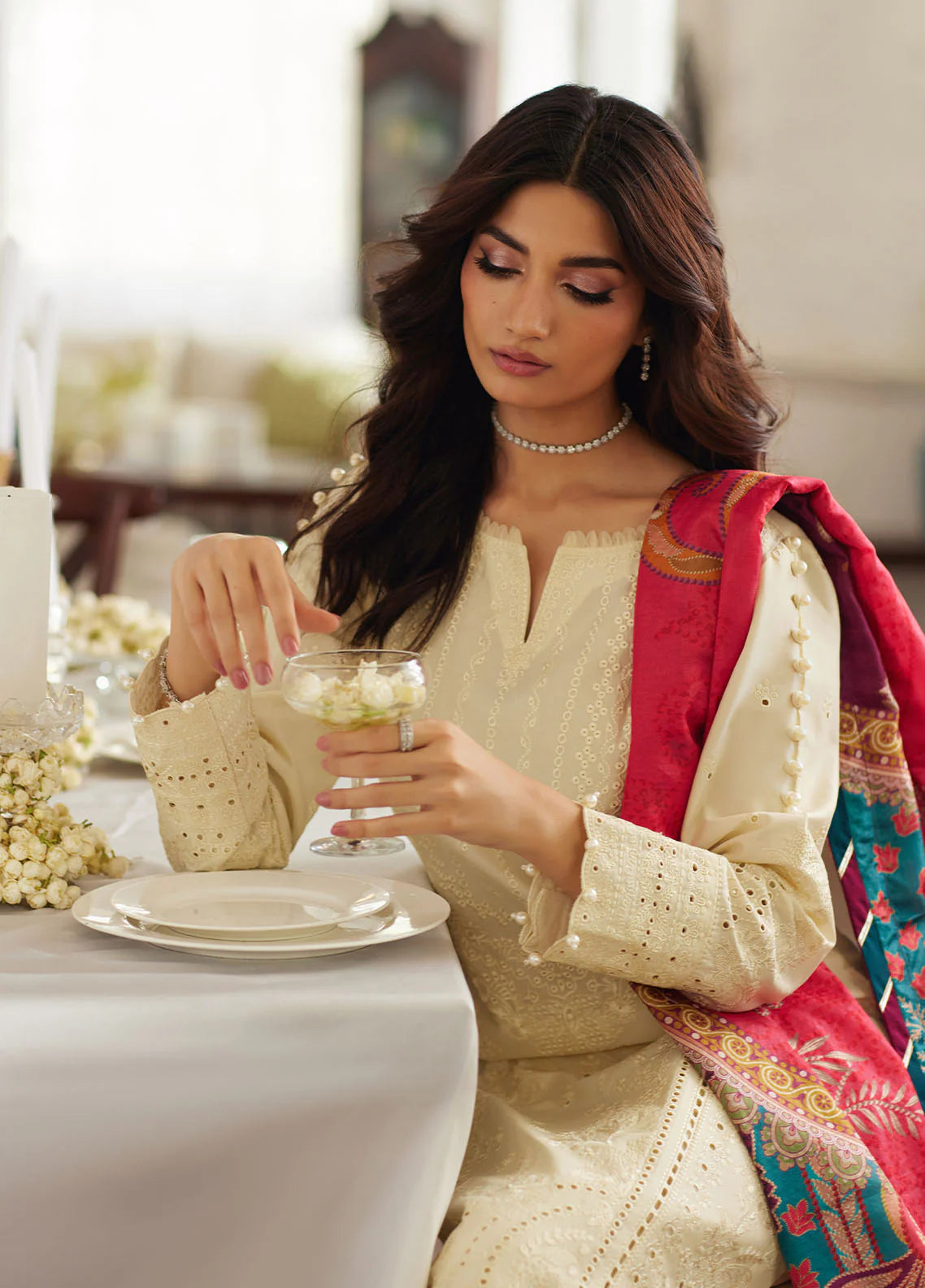 Model wearing off-white Azmin from Gulaal Lumiere Chikankaari Lawn, Pakistani luxury pret and Pakistani clothes online in UK.