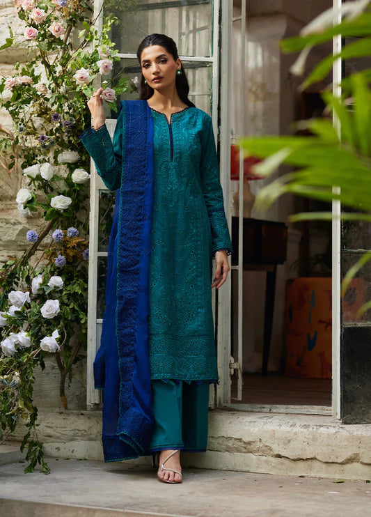 Model wearing teal blue Azura from Gulaal Lumiere Chikankaari Lawn, Pakistani luxury pret and Pakistani clothes online in UK.
