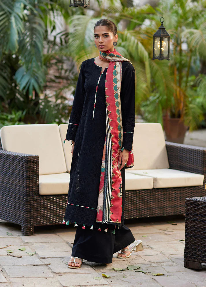 Model wearing black Solene from Gulaal Lumiere Chikankaari Lawn, Pakistani luxury pret and Pakistani clothes online in UK.
