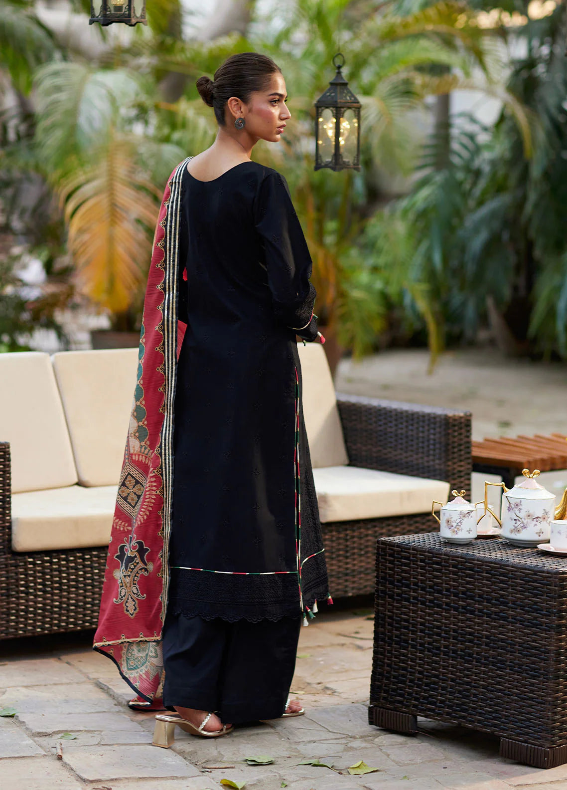 Model wearing black Solene from Gulaal Lumiere Chikankaari Lawn, Pakistani luxury pret and Pakistani clothes online in UK.