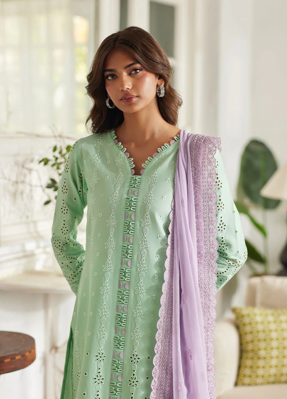 Model wearing mint green Alira from Gulaal Lumiere Chikankaari Lawn, Pakistani luxury pret and Pakistani clothes online in UK.