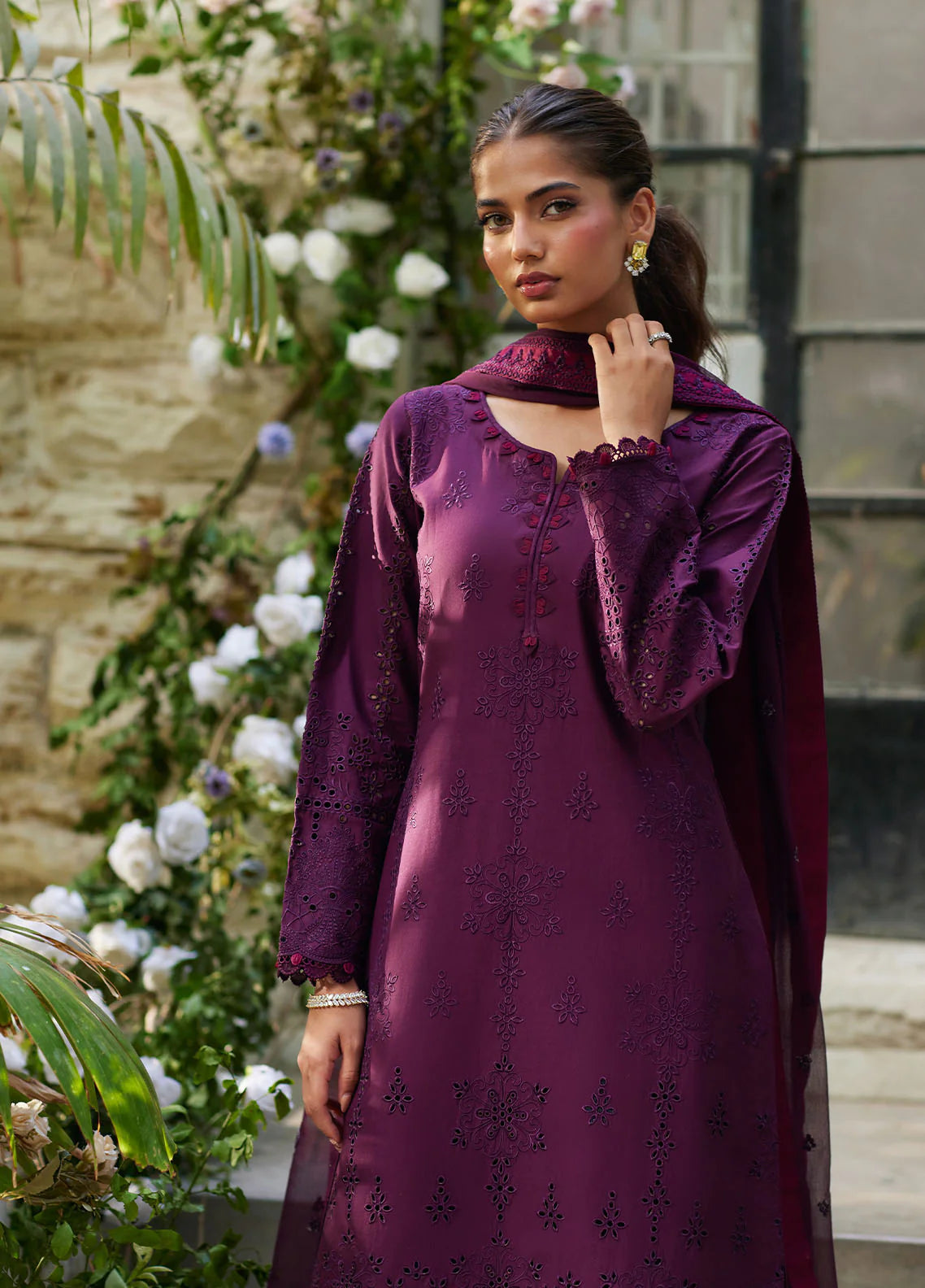 Model wearing deep plum Amora from Gulaal Lumiere Chikankaari Lawn, Pakistani luxury pret and Pakistani clothes online in UK.
