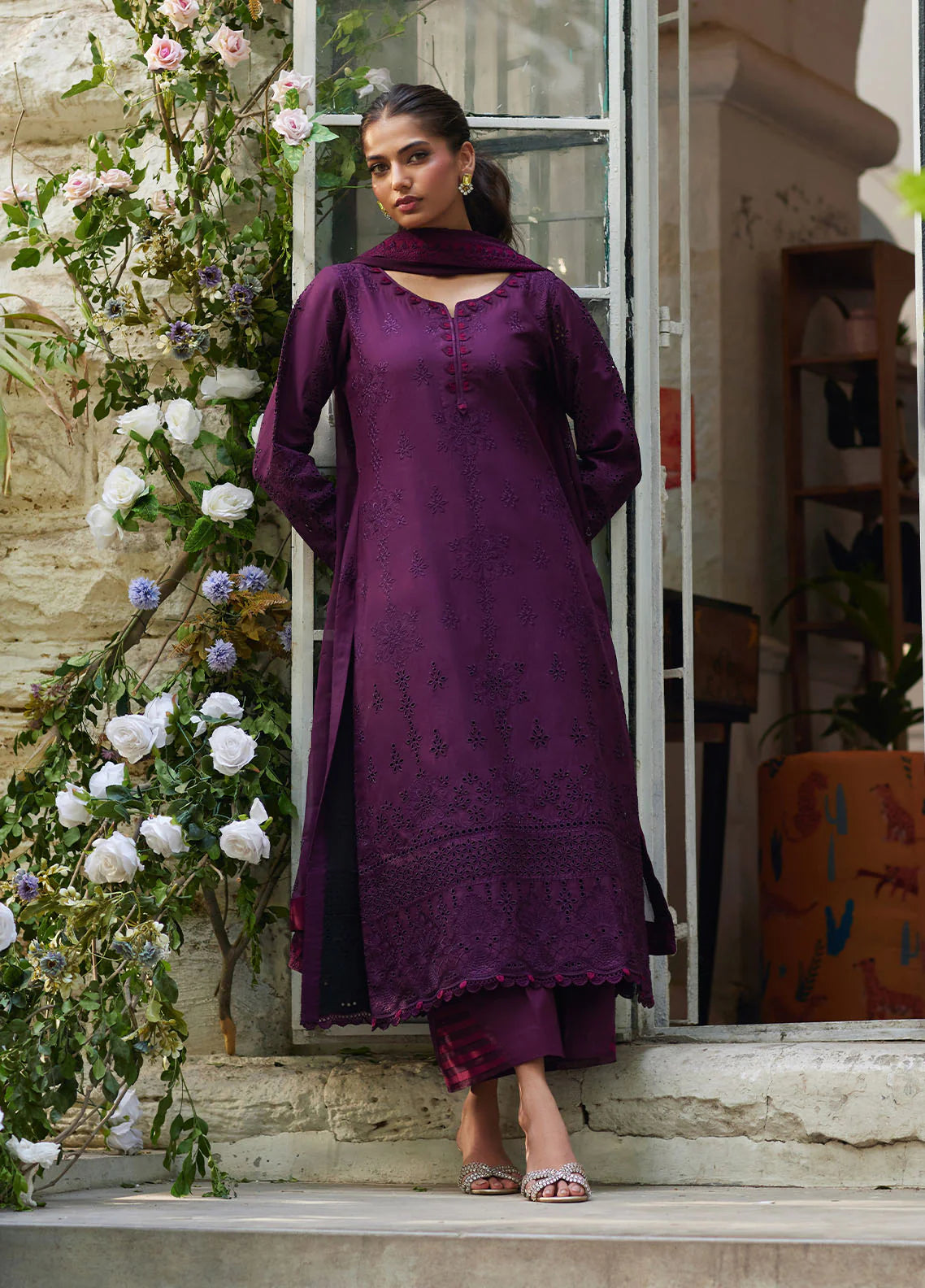 Model wearing deep plum Amora from Gulaal Lumiere Chikankaari Lawn, Pakistani luxury pret and Pakistani clothes online in UK.
