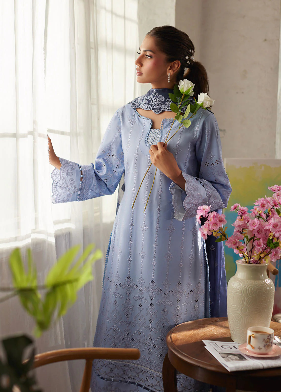 Model wearing powder blue Zorya from Gulaal Lumiere Chikankaari Lawn, Pakistani luxury pret and Pakistani clothes online in UK.