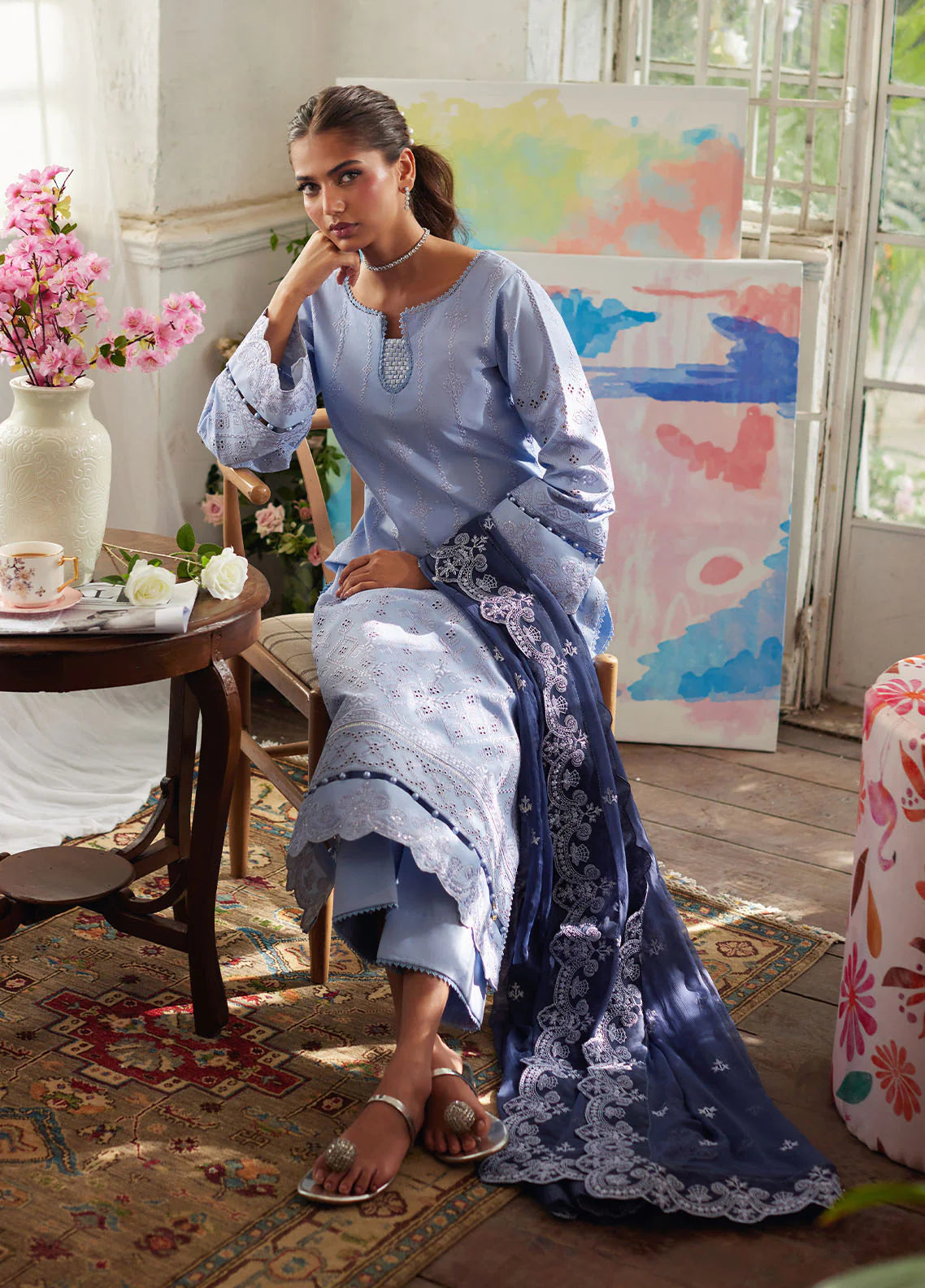 Model wearing powder blue Zorya from Gulaal Lumiere Chikankaari Lawn, Pakistani luxury pret and Pakistani clothes online in UK.