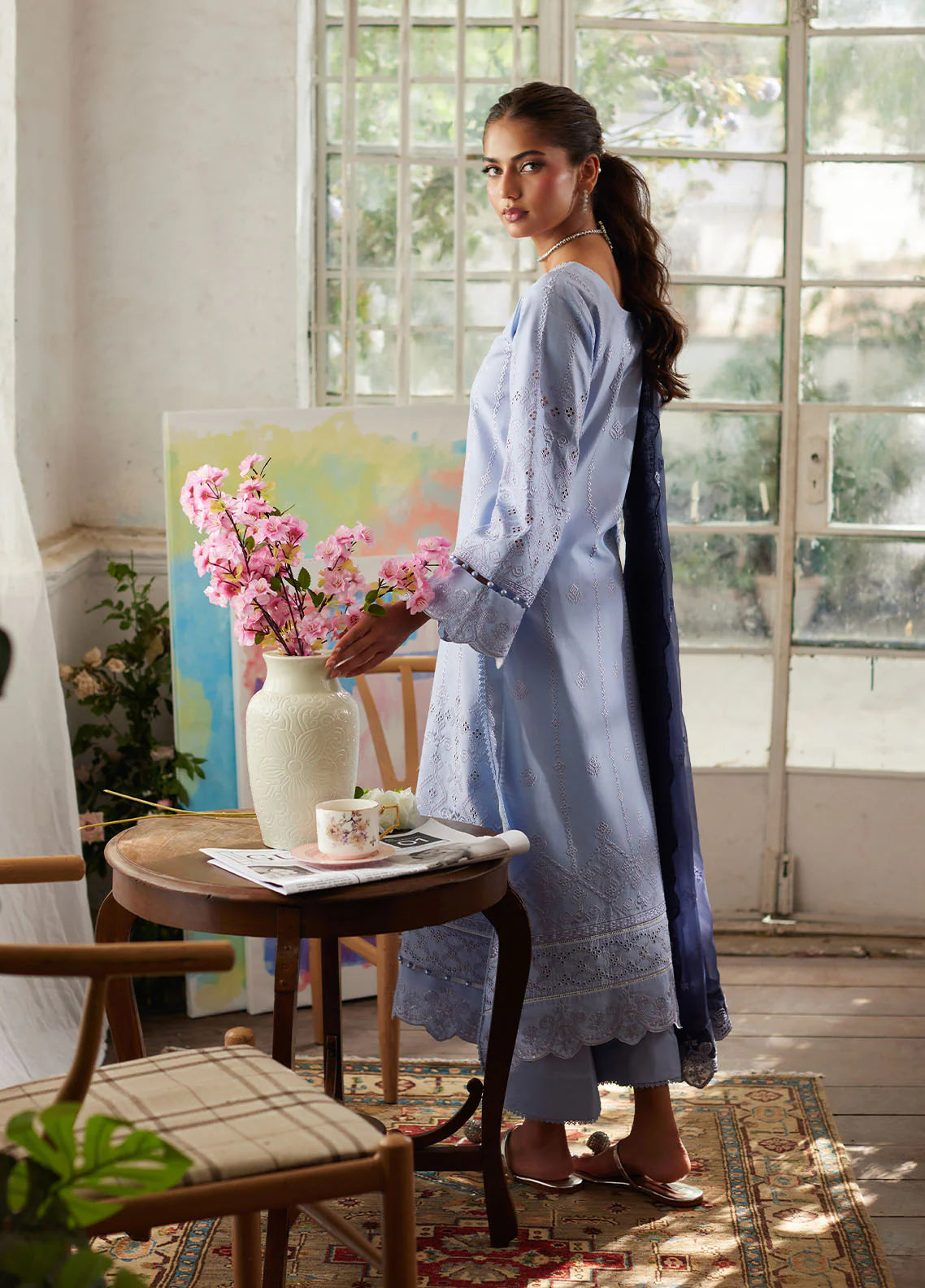 Model wearing powder blue Zorya from Gulaal Lumiere Chikankaari Lawn, Pakistani luxury pret and Pakistani clothes online in UK.
