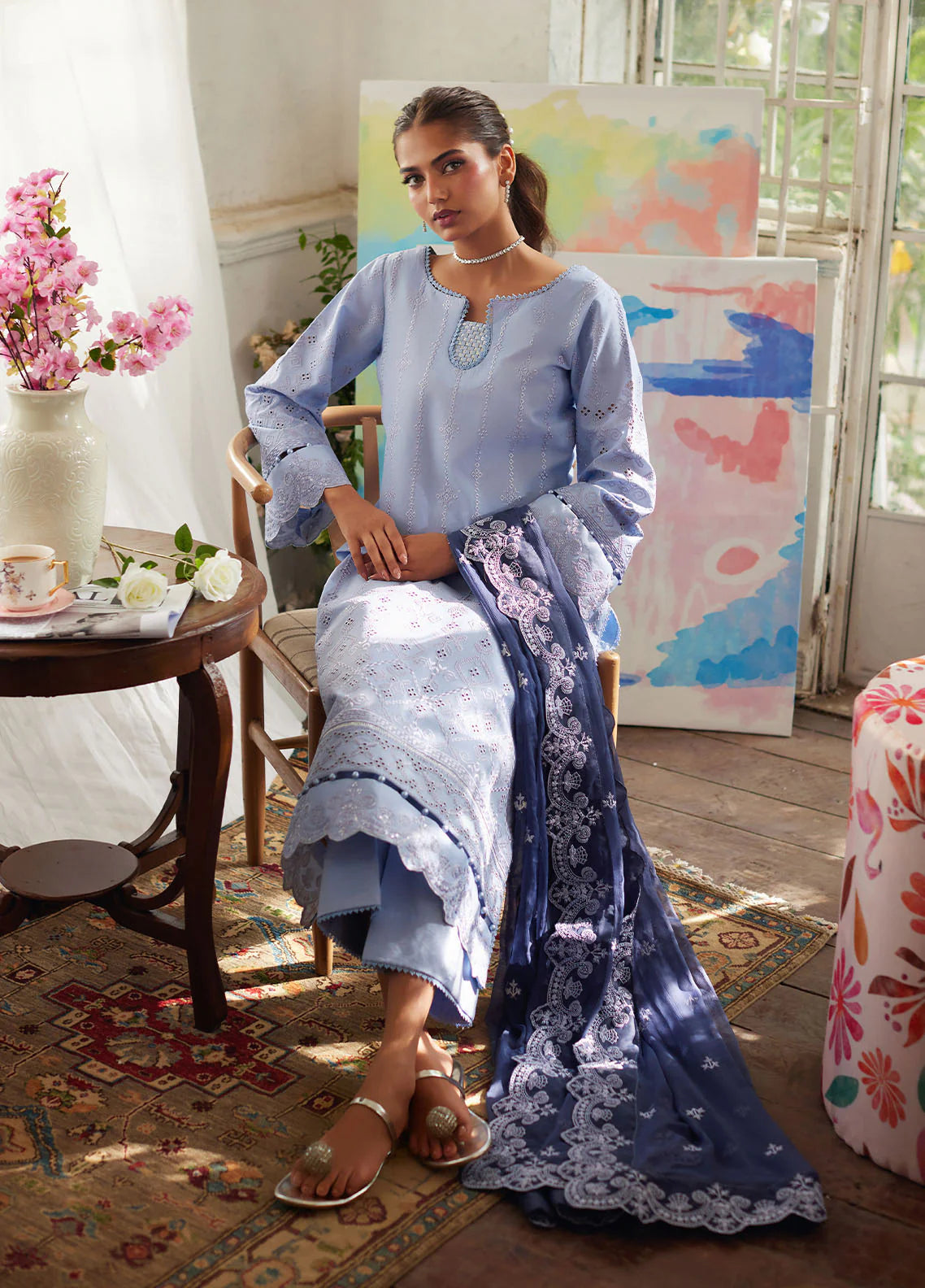Model wearing powder blue Zorya from Gulaal Lumiere Chikankaari Lawn, Pakistani luxury pret and Pakistani clothes online in UK.