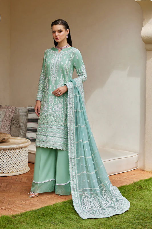 Model wearing Gulaal FREESIA mint green luxury lawn dress with intricate embroidery. Shop Pakistani luxury pret online in the UK for a stylish look.