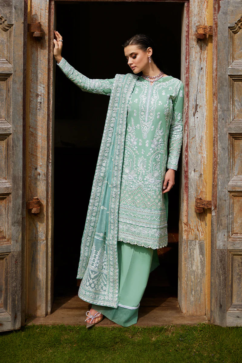 Model wearing Gulaal FREESIA mint green luxury lawn dress with intricate embroidery. Shop Pakistani luxury pret online in the UK for a stylish look.