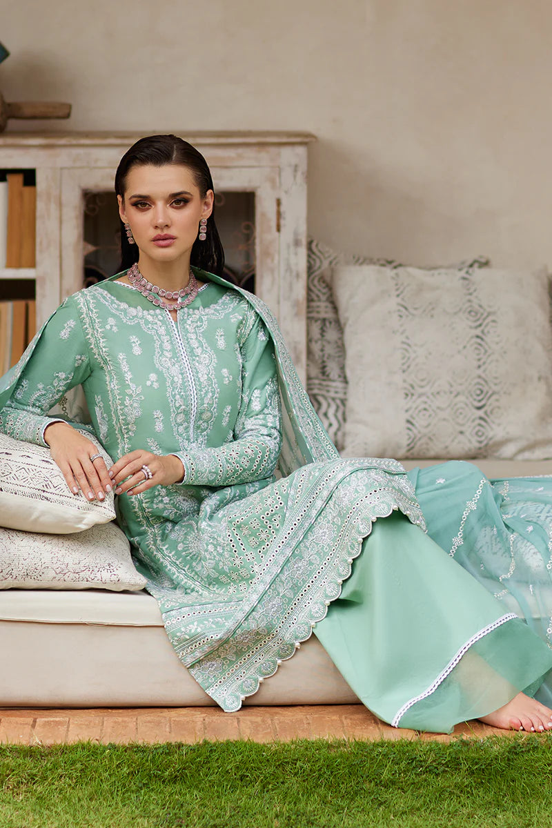 Model wearing Gulaal FREESIA mint green luxury lawn dress with intricate embroidery. Shop Pakistani luxury pret online in the UK for a stylish look.