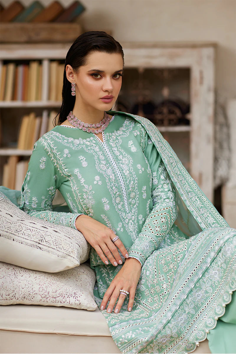 Model wearing Gulaal FREESIA mint green luxury lawn dress with intricate embroidery. Shop Pakistani luxury pret online in the UK for a stylish look.