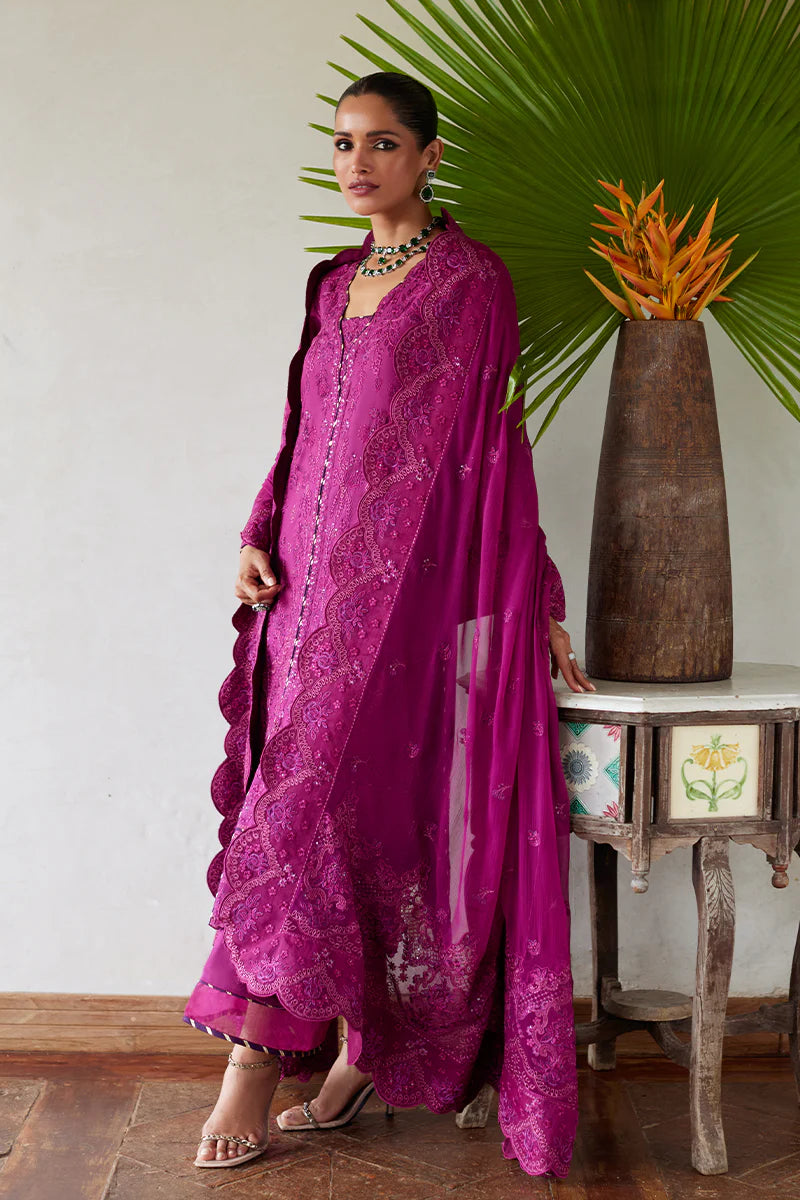 Model wearing Gulaal HAZEL purple luxury lawn dress with intricate embroidery. Shop Pakistani luxury pret online in the UK for an elegant look.