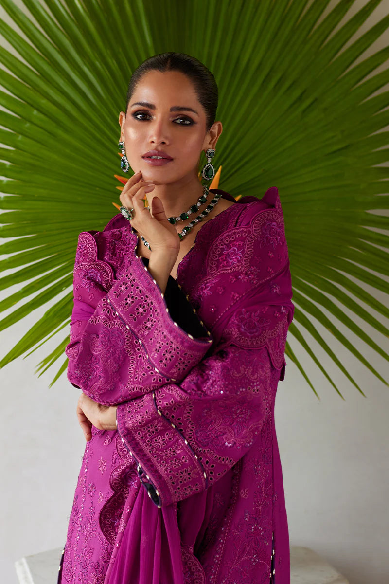 Model wearing Gulaal HAZEL purple luxury lawn dress with intricate embroidery. Shop Pakistani luxury pret online in the UK for an elegant look.