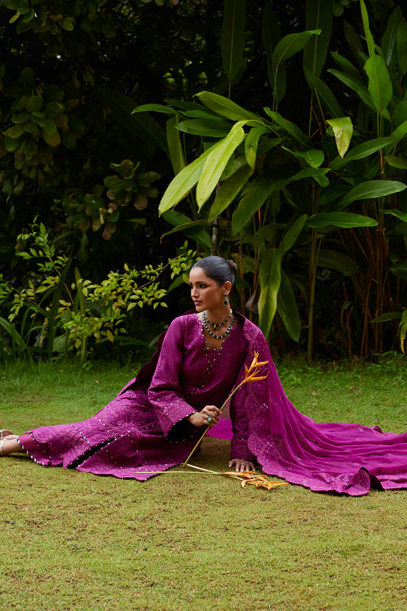 Model wearing Gulaal HAZEL purple luxury lawn dress with intricate embroidery. Shop Pakistani luxury pret online in the UK for an elegant look.