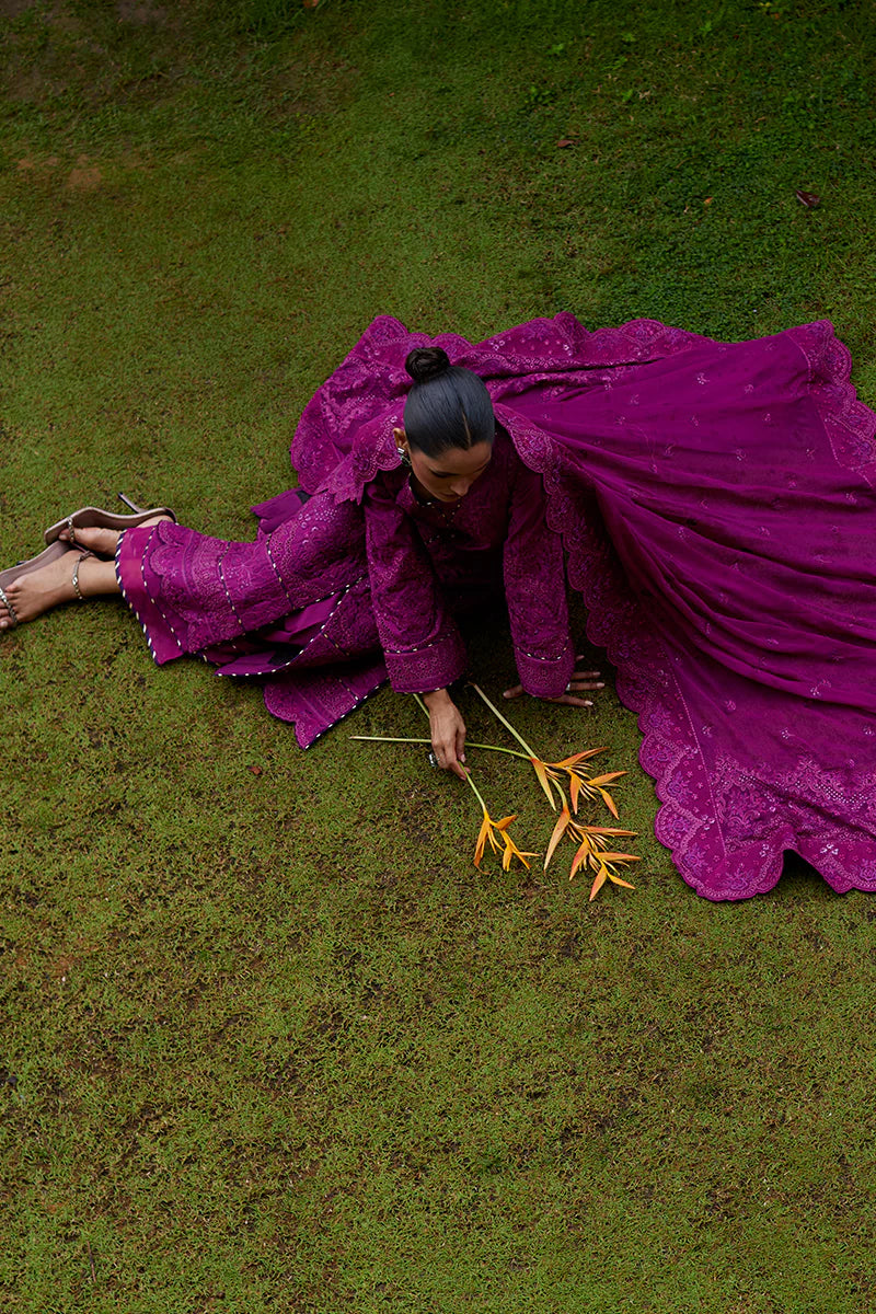 Model wearing Gulaal HAZEL purple luxury lawn dress with intricate embroidery. Shop Pakistani luxury pret online in the UK for an elegant look.