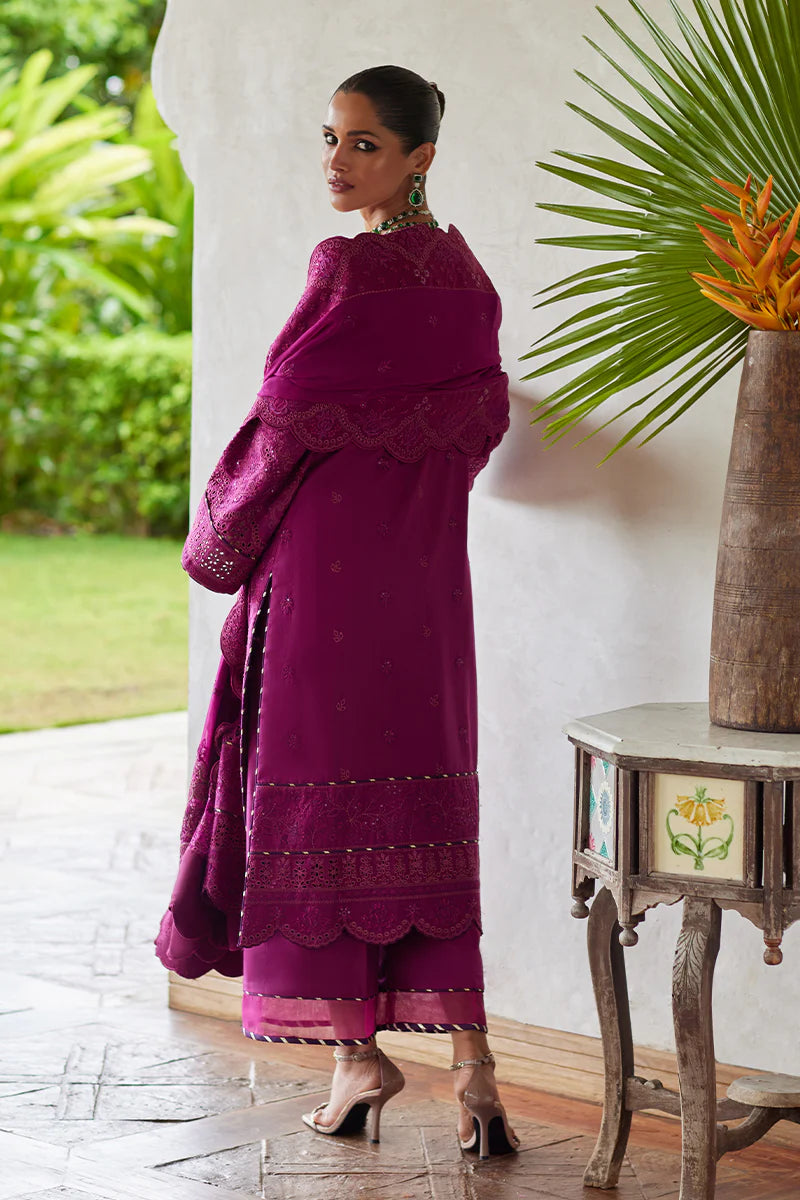 Model wearing Gulaal HAZEL purple luxury lawn dress with intricate embroidery. Shop Pakistani luxury pret online in the UK for an elegant look.