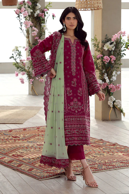 Model wearing deep magenta Gulaal Aaliyah outfit with intricate embroidery, ideal for Pakistani luxury pret and festive wear online in UK.