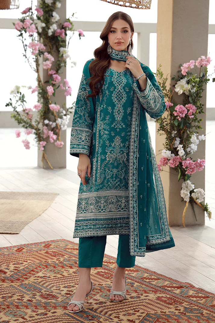 Model wearing teal Gulaal Ariana outfit with white thread embroidery, perfect for Pakistani luxury pret and festive wear online in the UK.